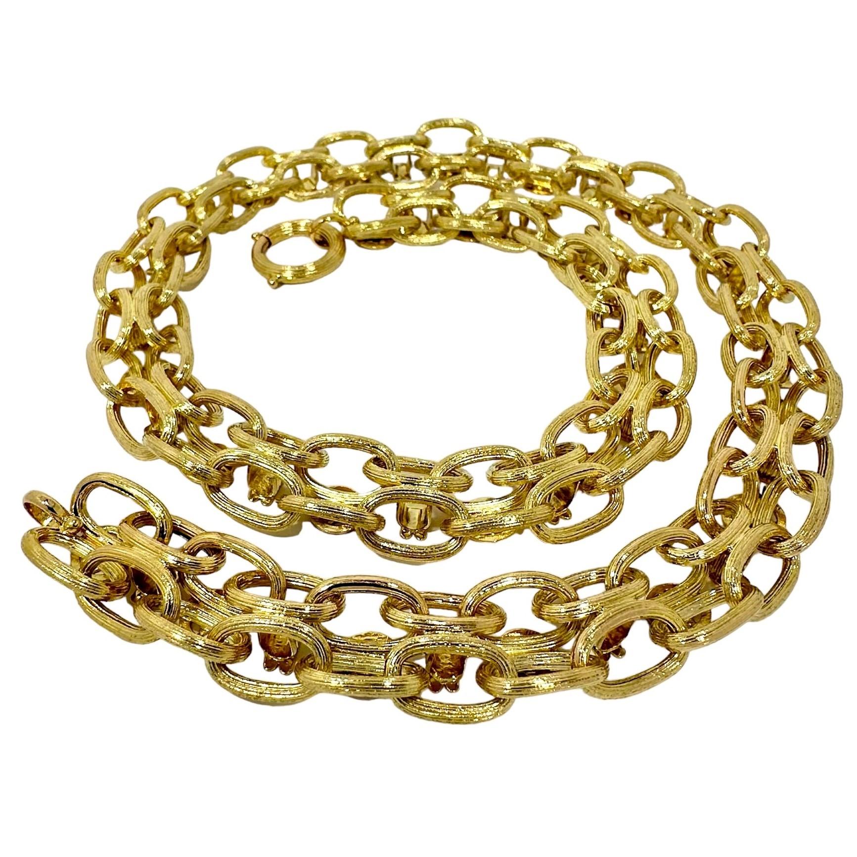 This original Victorian Period 14k yellow gold neck chain is fully reversible and, by virtue of it's removable clasp can be adjusted to wear at any length up to it's full 22 inches. It measures 5/8 inches wide and 1/4 inch in height, making this an