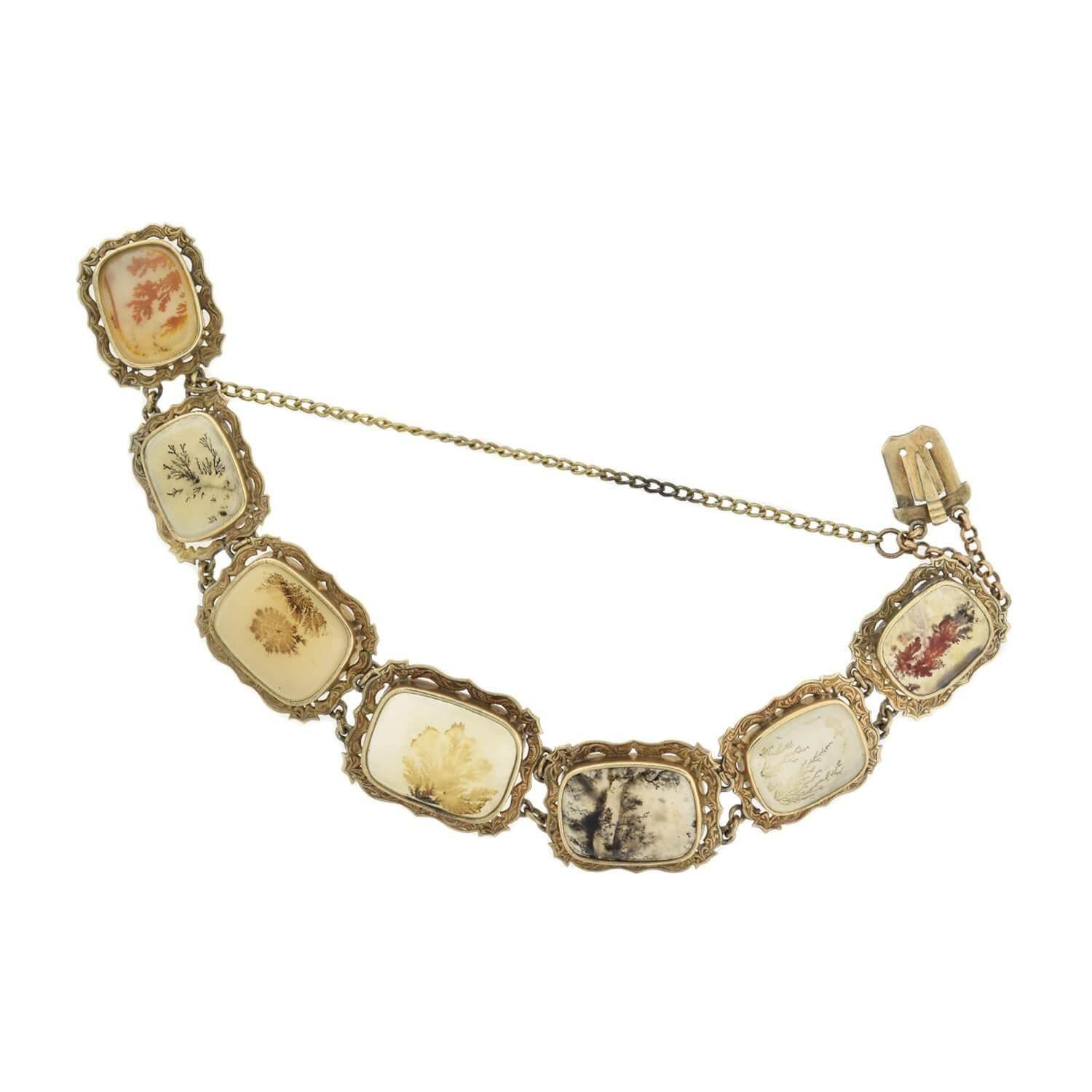 ¡Extraordinaria pulsera de eslabones de ágata musgosa dendrítica de la época victoriana (hacia 1880)! Esta maravillosa pieza está elaborada en oro laminado y compuesta por siete eslabones de ágata que forman una fabulosa pulsera. Cada eslabón