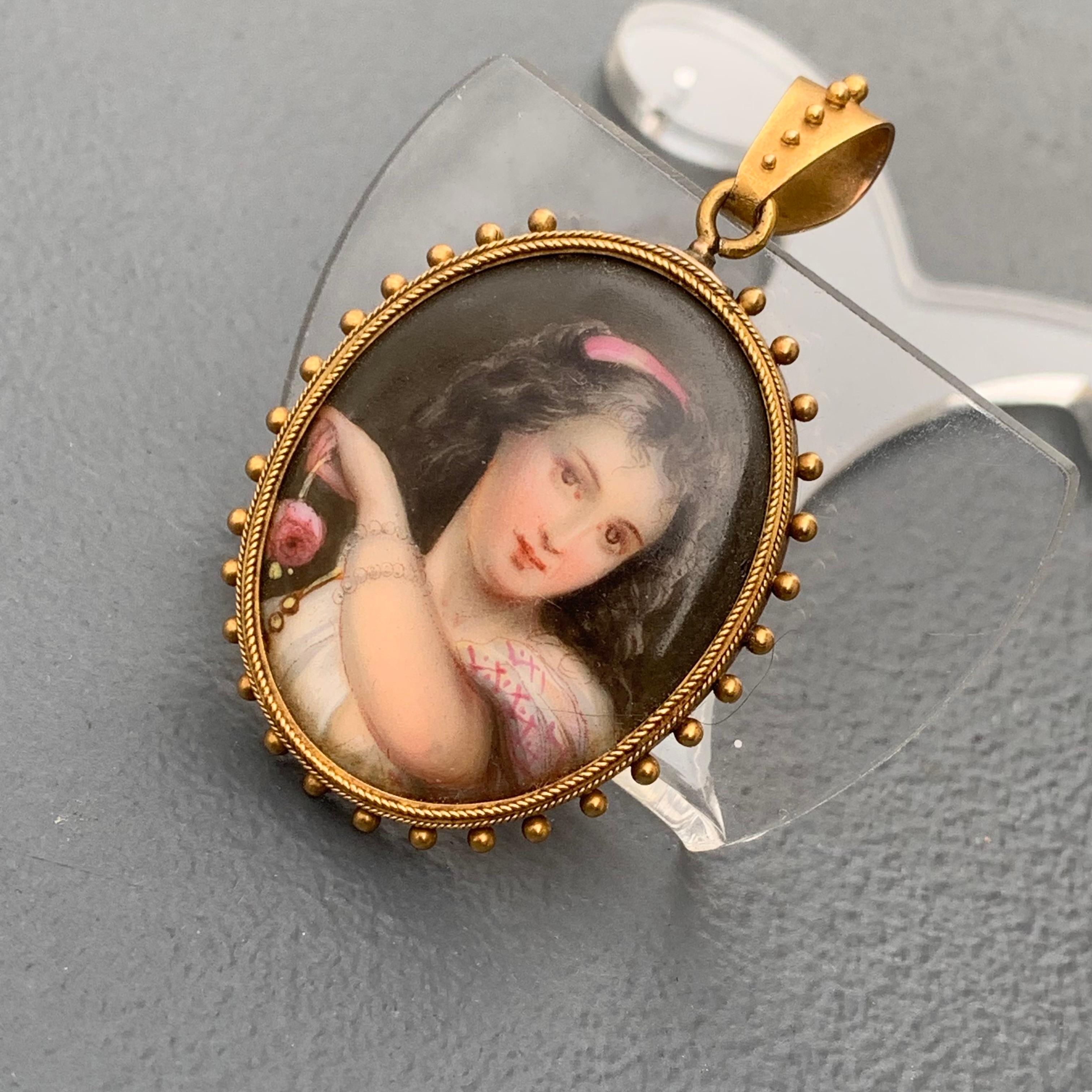 Gorgeous antique Victorian 14kt gold , hand painted girls miniature portrait pendant/ locket . Portrait is hand painted  with fine details on an ceramic plaque and features a beautiful young girl holding a rose in her hand with pearl bracelets .