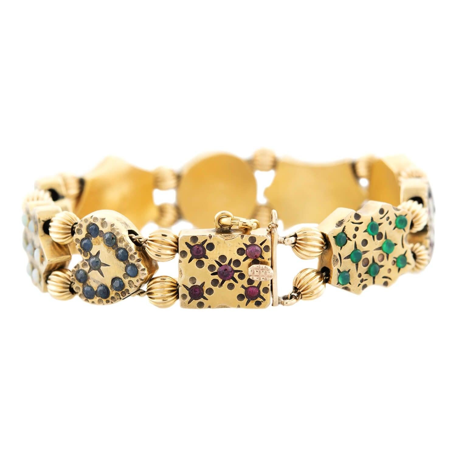 An incredible and unique multi-gemstone slide bracelet from the Victorian (ca1880) era! This stunning yellow gold compilation piece features ten highly decorative slide pendants gracing a beaded double-stranded chain. The gorgeous slides are formed