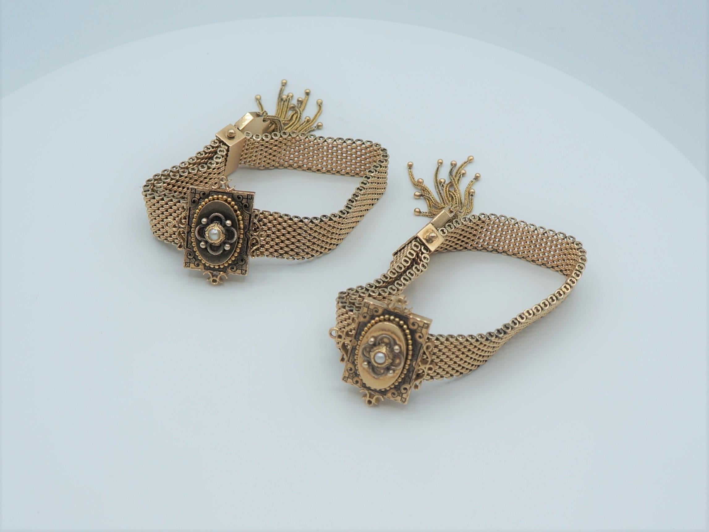 These stunning adjustable Victorian slider bracelets are solid 14k gold. 

The ends of the bracelets feature beautiful tassels which are connected to the 