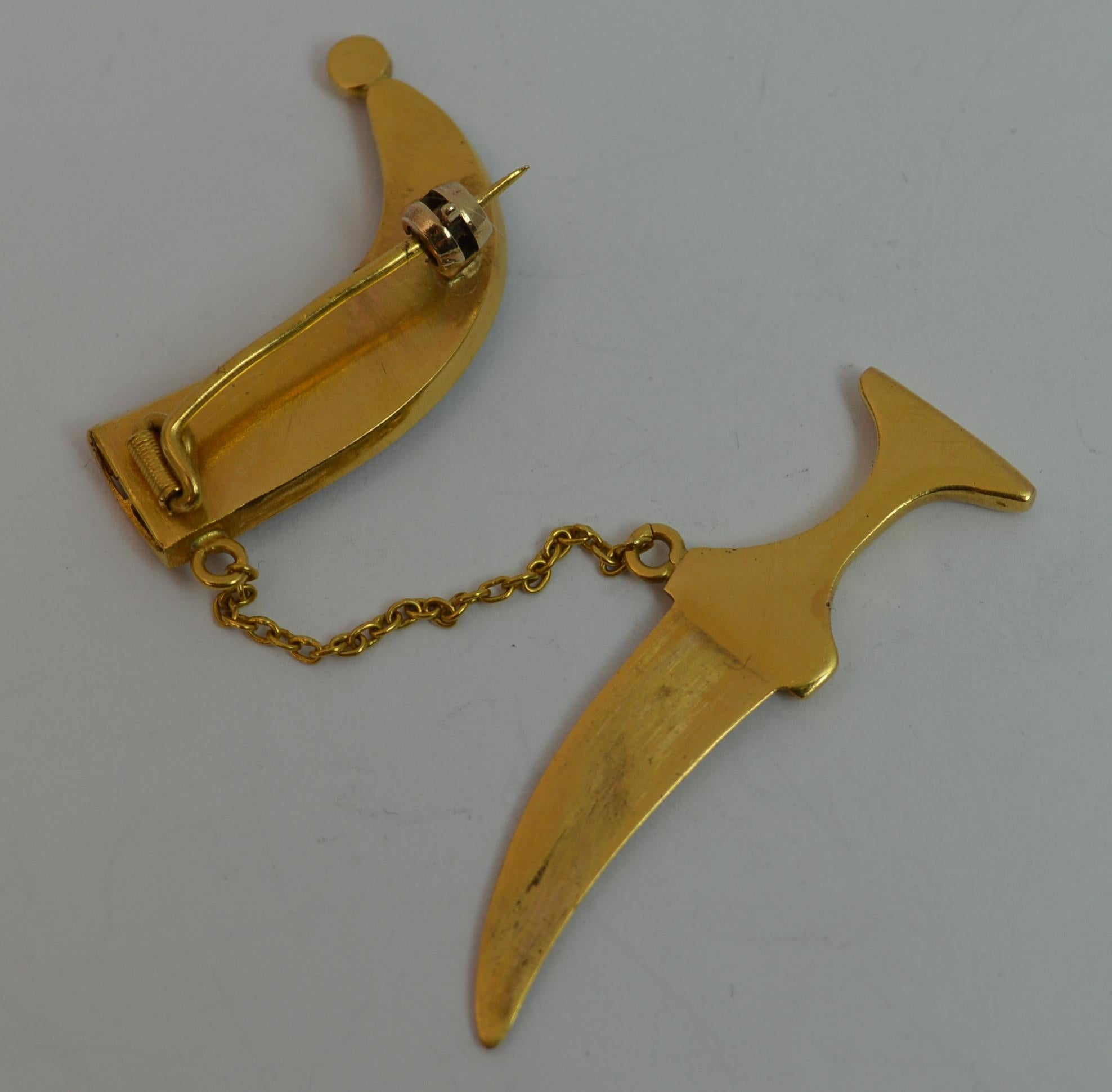 dagger brooch