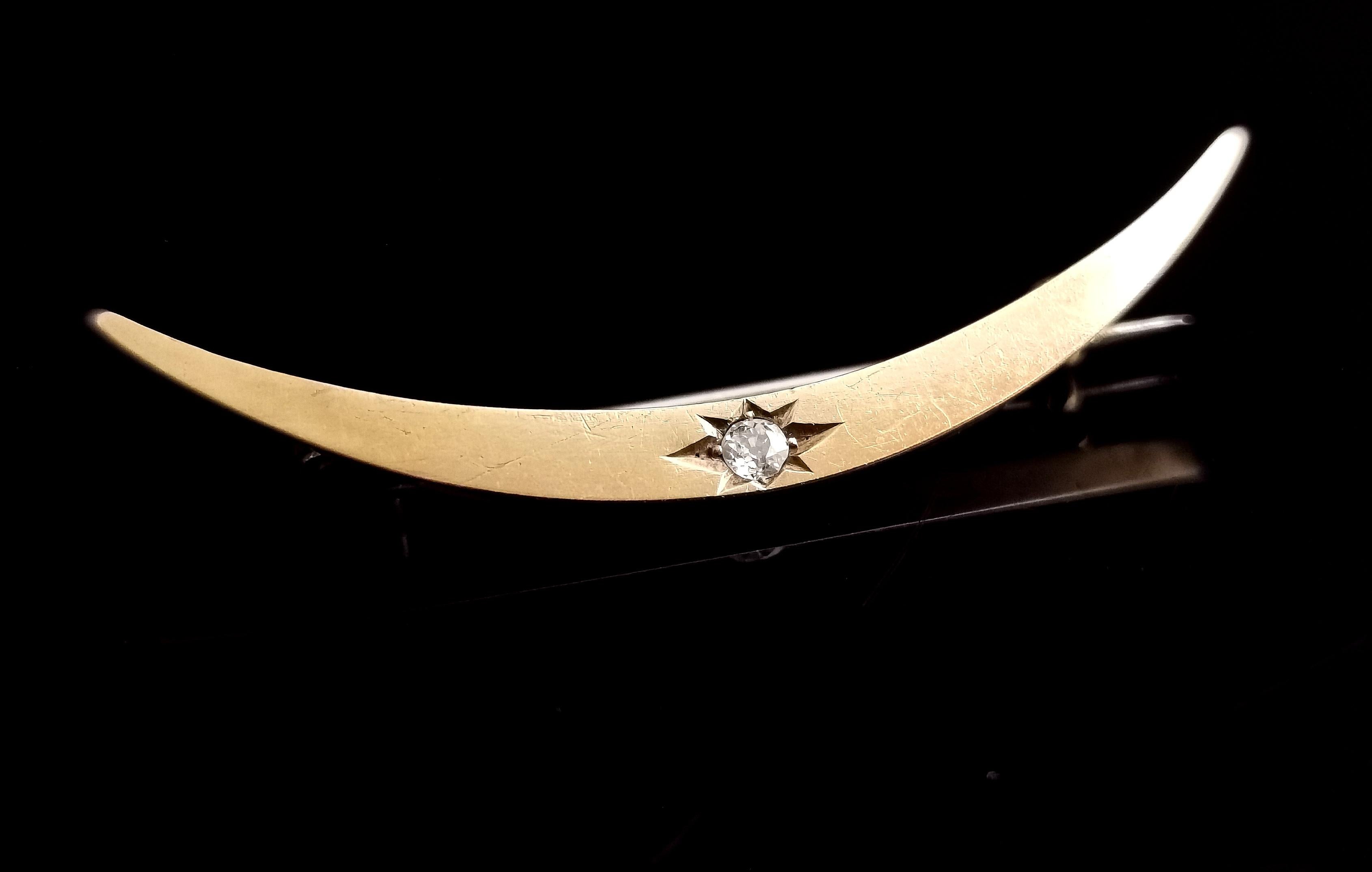 A very pretty late Victorian, 15kt gold diamond crescent brooch.

A beautiful curved rich gold moon star or gypsy set with a single sparkling old cut diamond.

Crescent moons were a popular motif in Victorian and later Edwardian jewellery, they are