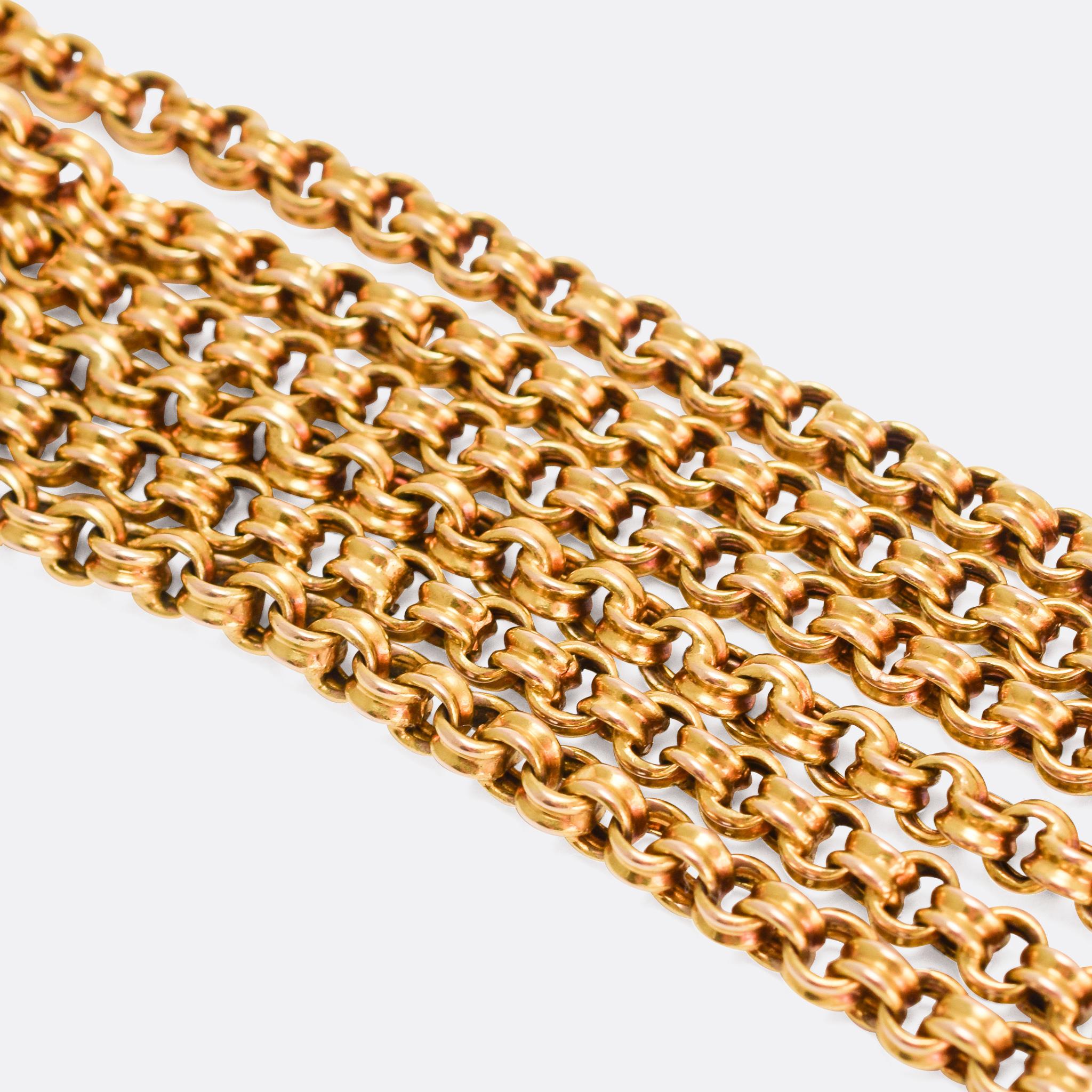 A splendid 15 karat gold guard chain dating from the late Victorian era. At 64 inches in length, and with fancy belcher links, it's a particularly nice example.

MEASUREMENTS 
Length: 64 inches

WEIGHT 
63.8g

MARKS 
Stamped 15k gold
J M Maker's Mark