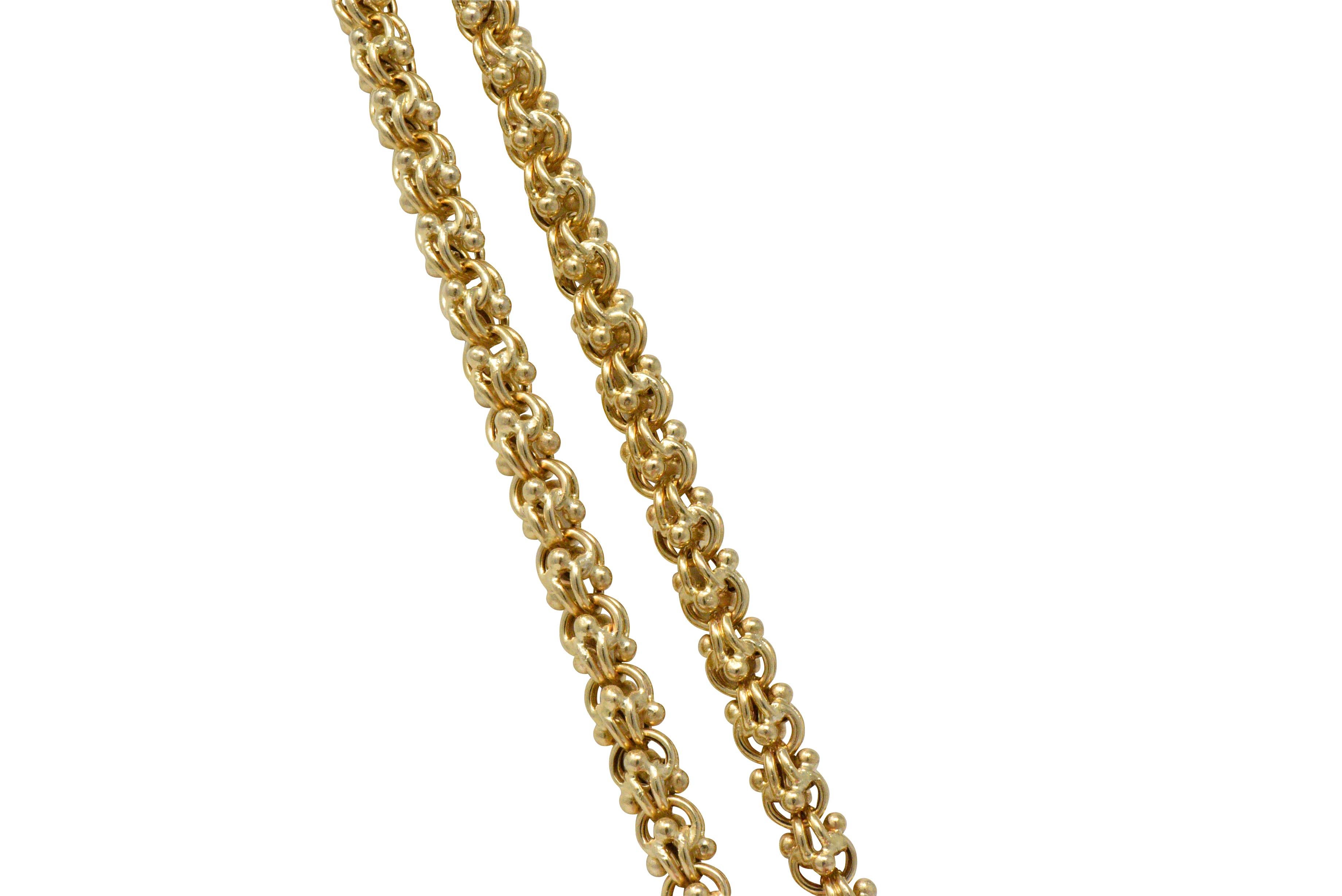 Hollow double round link style chain

Unique gold bead detail

Completed by a spring ring clasp

Stamped 15K

Length: 60 Inches

Width: 1/4 Inch

Total Weight: 128.4 Grams

Bold. Substantial. Statement.  
 
Stock Number:We- 2638