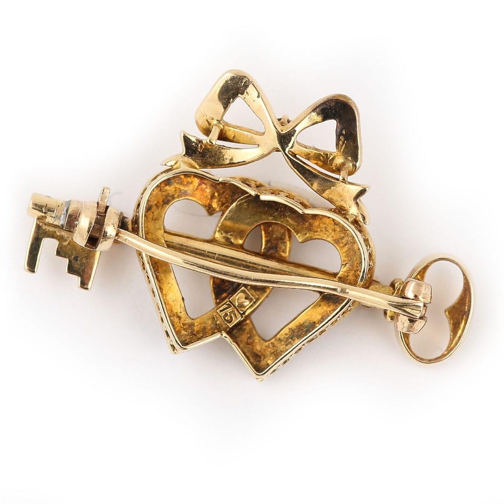 Victorian 15 Karat Gold Pearl Dual Sweet Heart, Ruby Key and Diamond Bow Brooch In Good Condition In Lancashire, Oldham