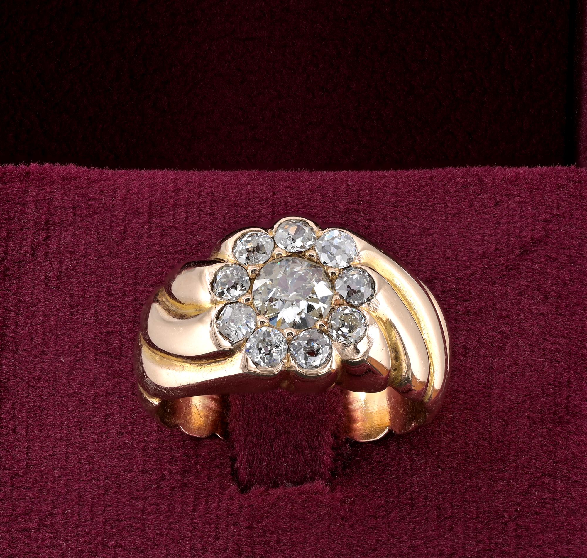 This fabulous late Victorian ring is 1900 ca
Beautiful carved twisted mount hand made of solid 18 KT gold centred by a cluster of Diamond
Weight is 11.8 grams
Set with a selection of old European cut centre Diamond is .60 Ct. (J/VS/Si) spreading as