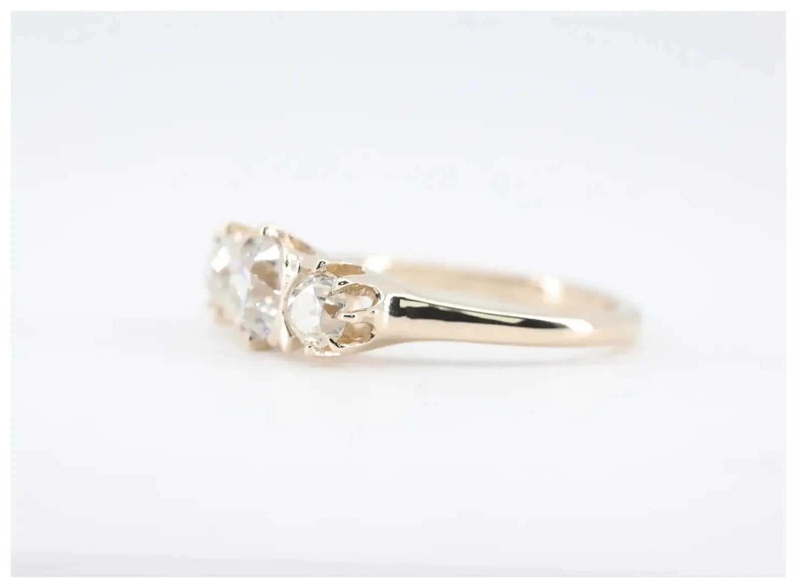 Old Mine Cut Victorian 1.52 CTW Three Stone Diamond Engagement Ring in 14K Yellow Gold For Sale