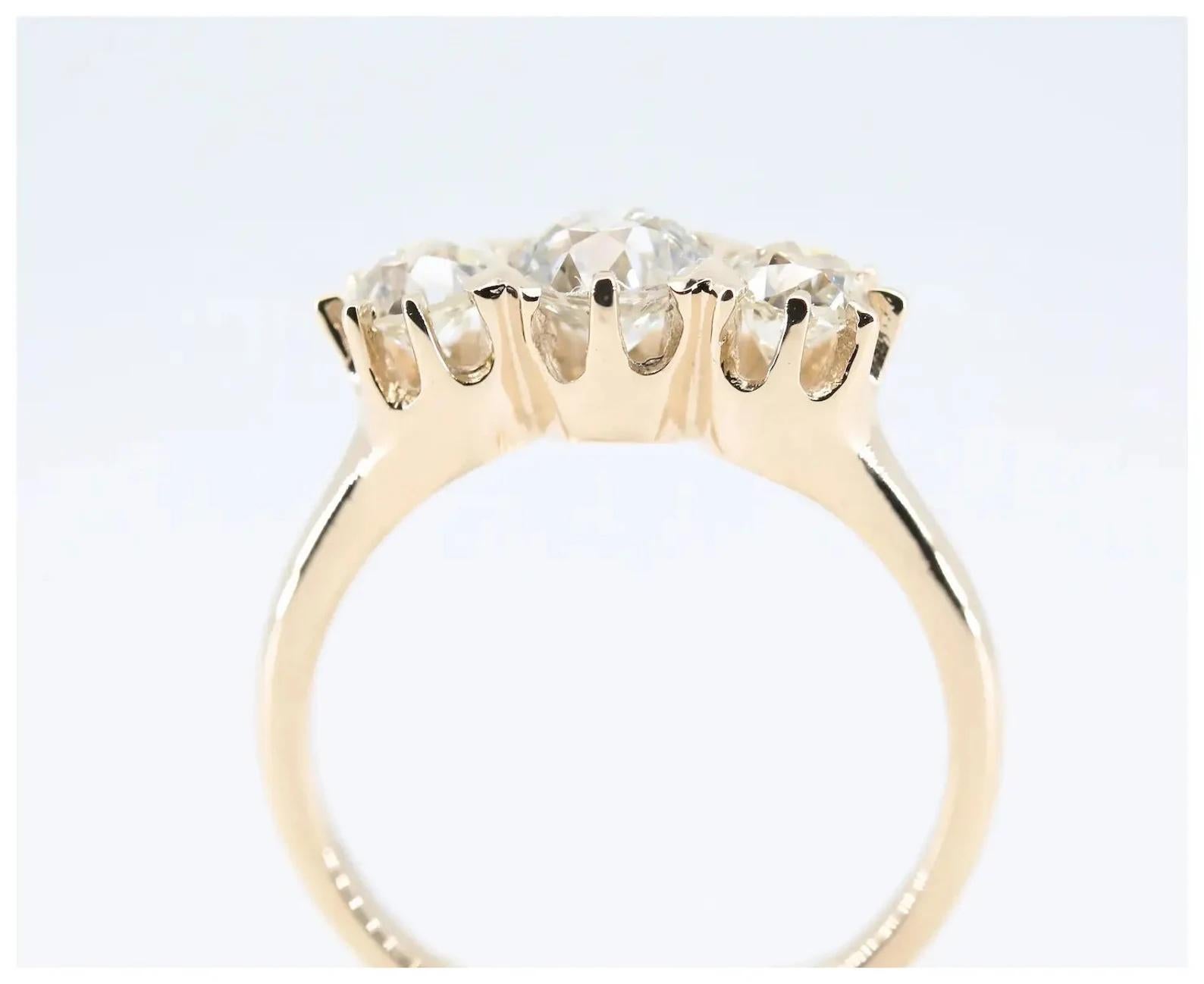 Victorian 1.52 CTW Three Stone Diamond Engagement Ring in 14K Yellow Gold In Good Condition For Sale In Boston, MA