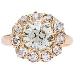 Victorian 1.57 Carat Old Mine Cut Diamond Gold Halo Engagement Ring