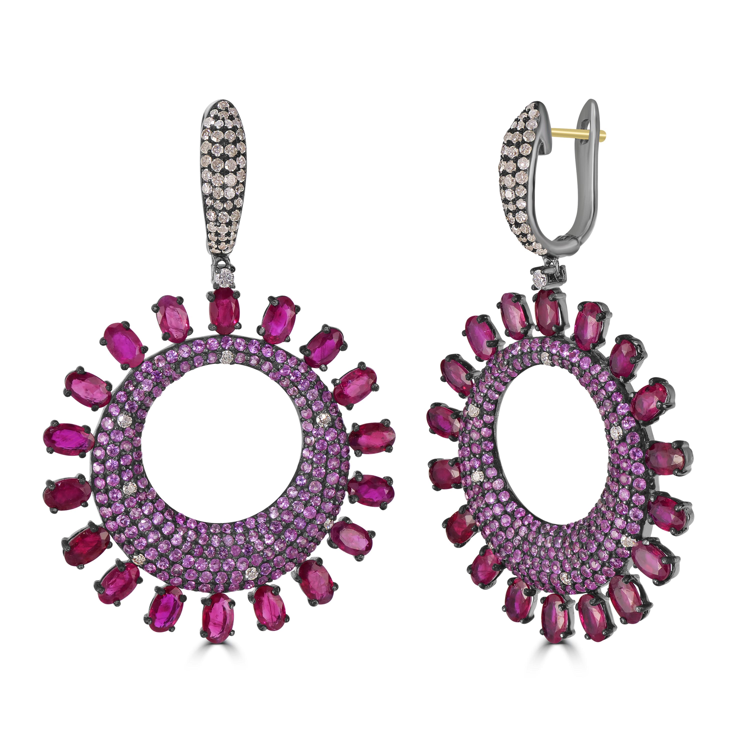 Introducing the enchanting Victorian 15.72 Cttw. Pink Sapphire, Ruby, and Diamond Dangle Earrings—a symphony of elegance and vibrant hues.

The focal point of these exquisite earrings is a circular drop, a kaleidoscope of pave pink sapphires and