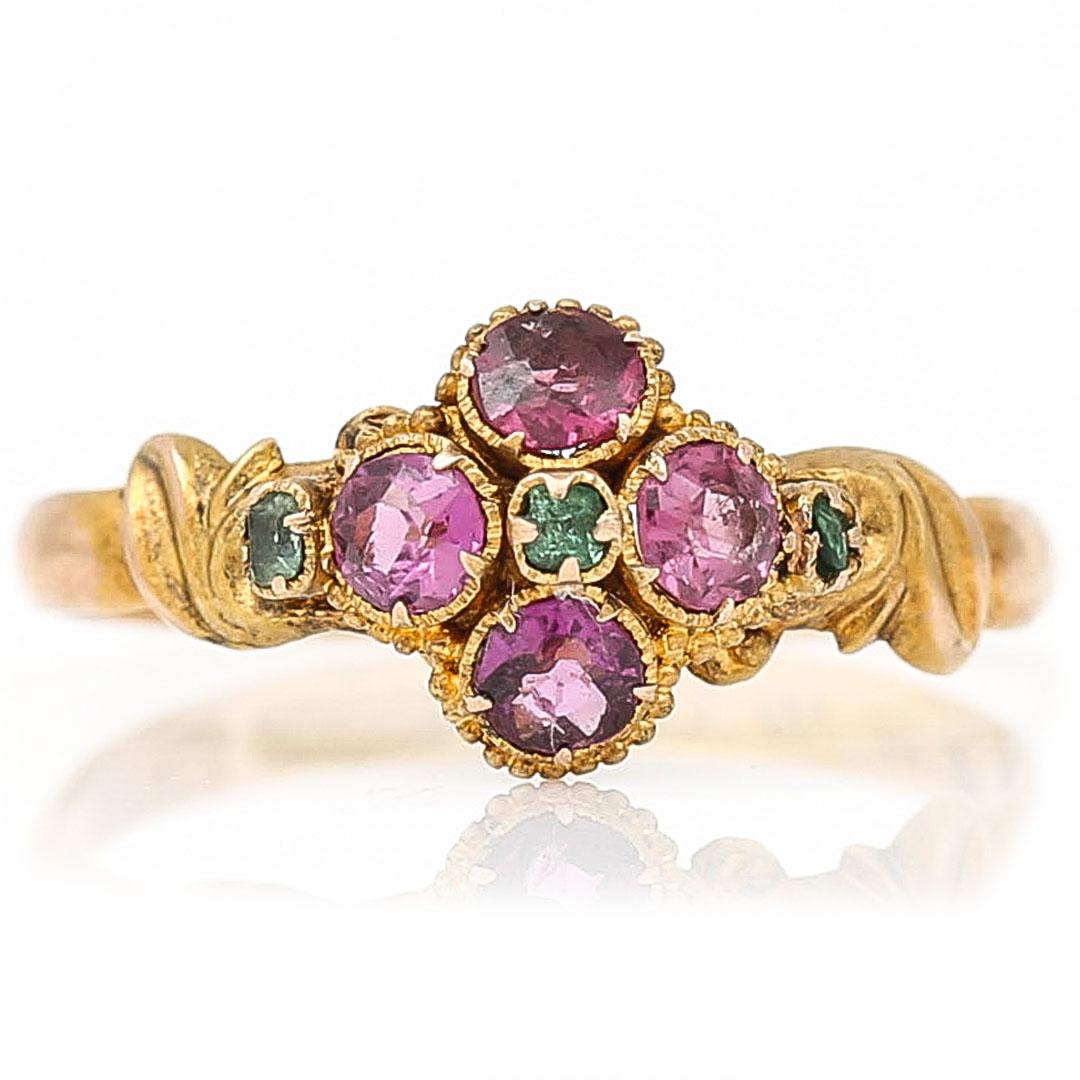 A truly elegant mid Victorian 15ct gold garnet floral ring dating from circa 1867 its design is so typical of the period and would make for an excellent addition to your jewellery box. The head of the ring is crafted in buttery 15ct gold with a