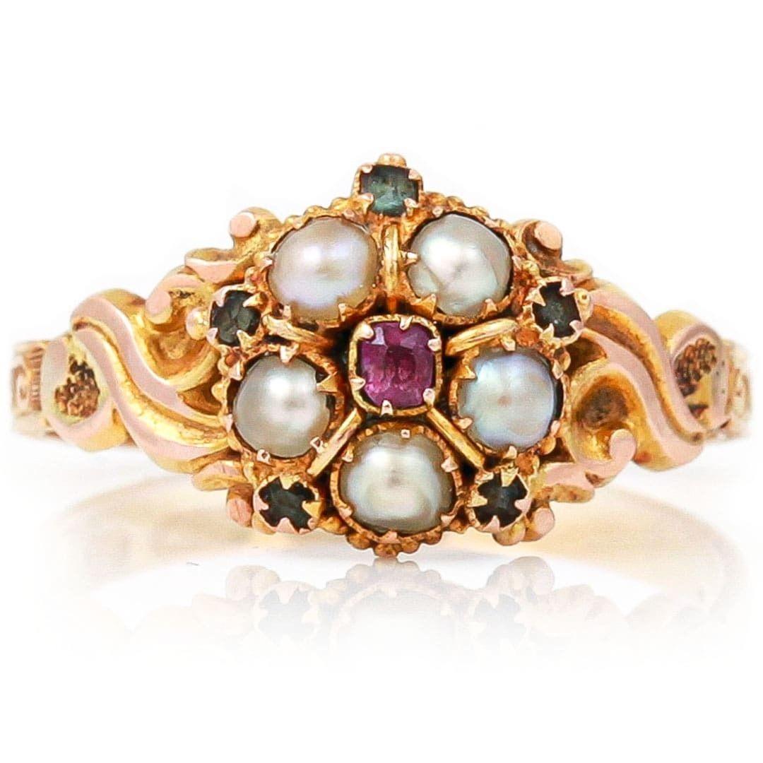 An immaculate high Victorian 15ct yellow gold pink sapphire, pearl and green beryl cluster ring dating from circa 1866. This fabulous antique cluster ring is a collectors dream, for over 150 years it appears to be seldom worn - if at all. The gems