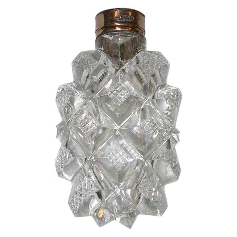Flacon de parfum victorien en verre taillé surmonté d'or de 15 carats, vers 1850