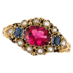 Viktorianischer 15 Karat Gelbgold Ring mit roter und blauer Paste und Perlen Cluster