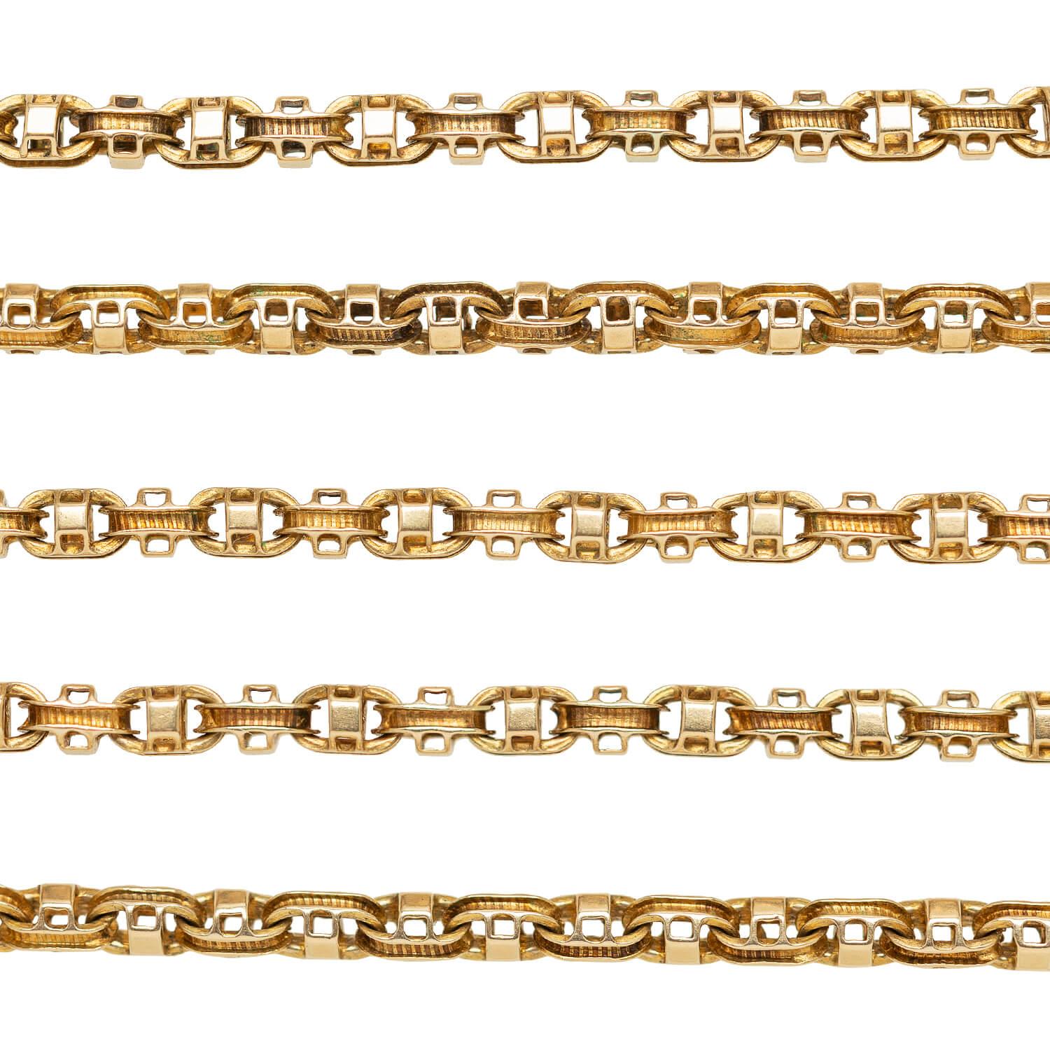 A gorgeous slide necklace from the Victorian (ca1880) era! Crafted in 15k yellow gold, interlocking fancy mariner links form the chain, accented with delicate line work details throughout each link. Included on the chain is a square slide, etched on