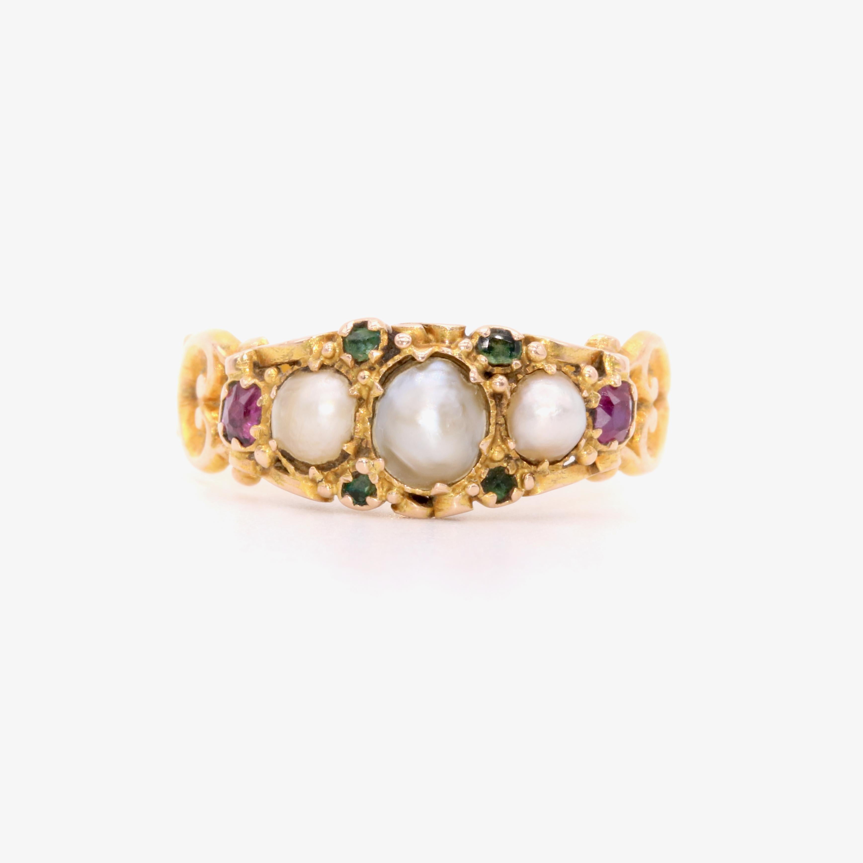 A Victorian pearl, almandine garnet, demantoid garnet, and yellow gold ring, comprising three half pearls, two almandine garnets, and four demantoid garnets, in 15 karat yellow gold. 

My favourite thing about this Victorian 15K Yellow Gold Pearl
