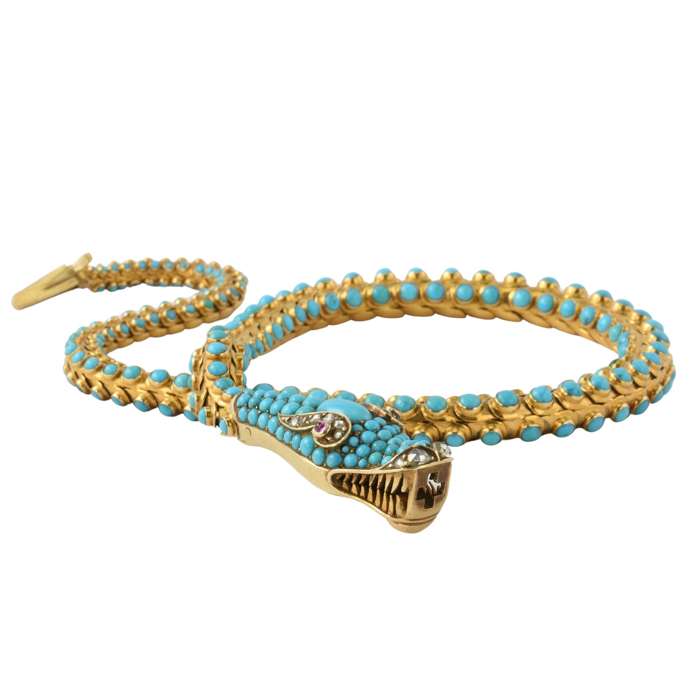 An Wonderful Victorian period snake necklace. Crafted from 15k gold set with cabochon turquoise, rose cut diamonds & rubies. The body is articulated offering realistic movement and flexibility. This versatile necklace can be wrapped around the wrist