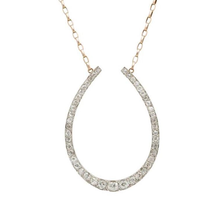 Victorian 15k Yellow Gold and Platinum and 5.0cts Old Mine Cut Diamond Horseshoe Necklace c.1880s

Additional Information
Period: Victorian
Year: 1880s
Material: 15k Yellow Gold and Diamond
Weight: 22.22g
Length: 88.9cm/35 inches, Horseshoe