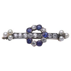 Broche victorienne en or 15kt et argent avec diamants, saphirs et perles