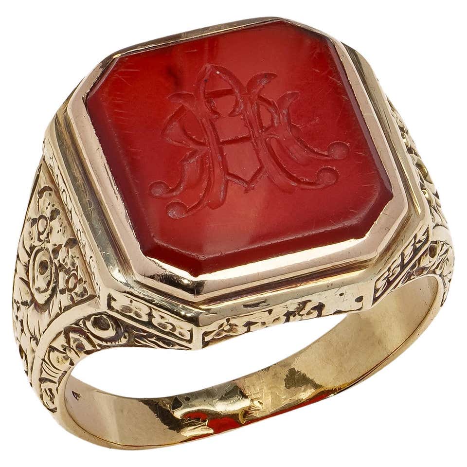 Carved Signet Rings 20kt. gold carved carnelian signet ring with coat of arms and Latin ...