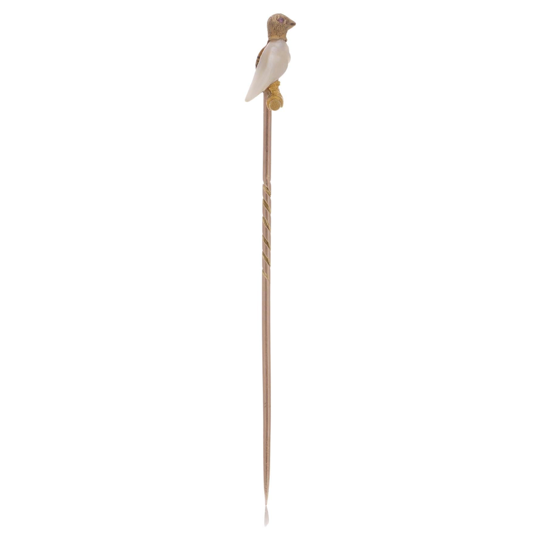 Victorian 15kt gold stick pin in the shape of a bird set with mother of pearl an