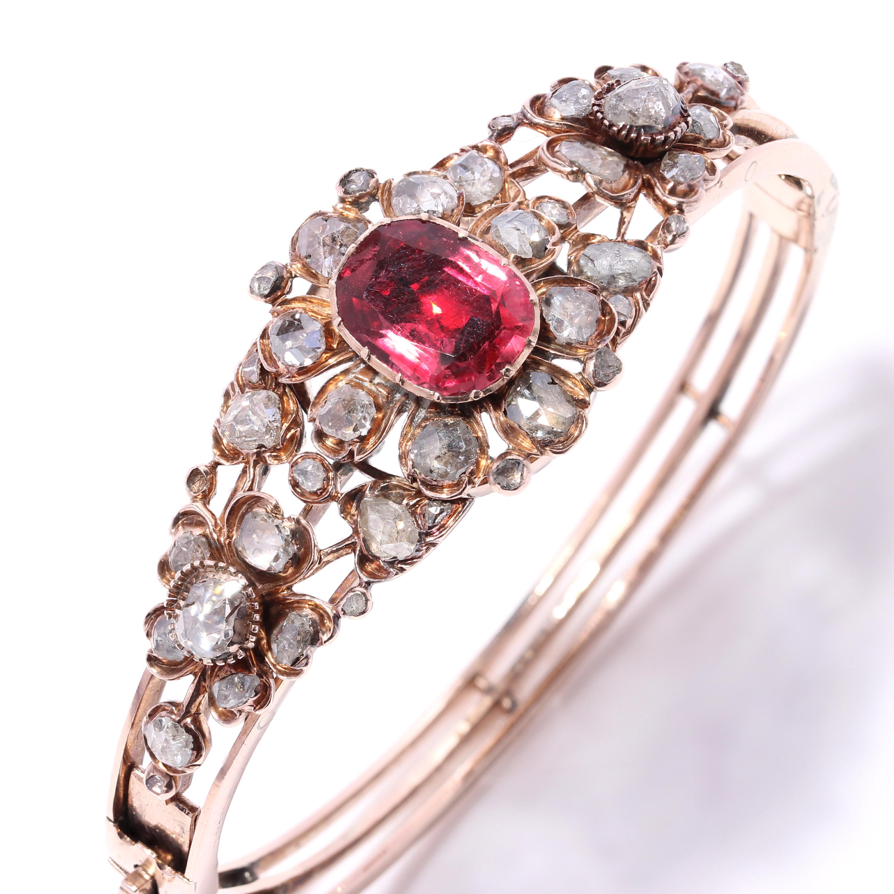 Antique Victorian 15kt pink gold ladies bangle with 4.00 ct. spinel and 4.52 ct. diamonds 
Made in England, Circa 1870's
Tested positive for 15kt gold.

Dimensions -
Size: 6.5 x 5.8 x 1.3 cm
Weight : 23.20 grams

Spinel -
Number of stones - 1 
Carat