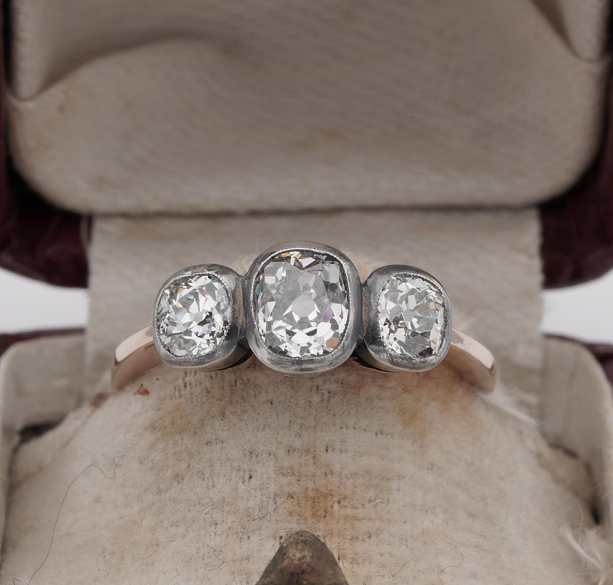 Amazing Victorian late 1800 Diamond trilogy ring in a classy statement design of the era
Hand crafted of solid 18 KT gold with Silver portions for the Diamond housing
Fine mount strong to be perfect as engagement or life companion
Displayed on top