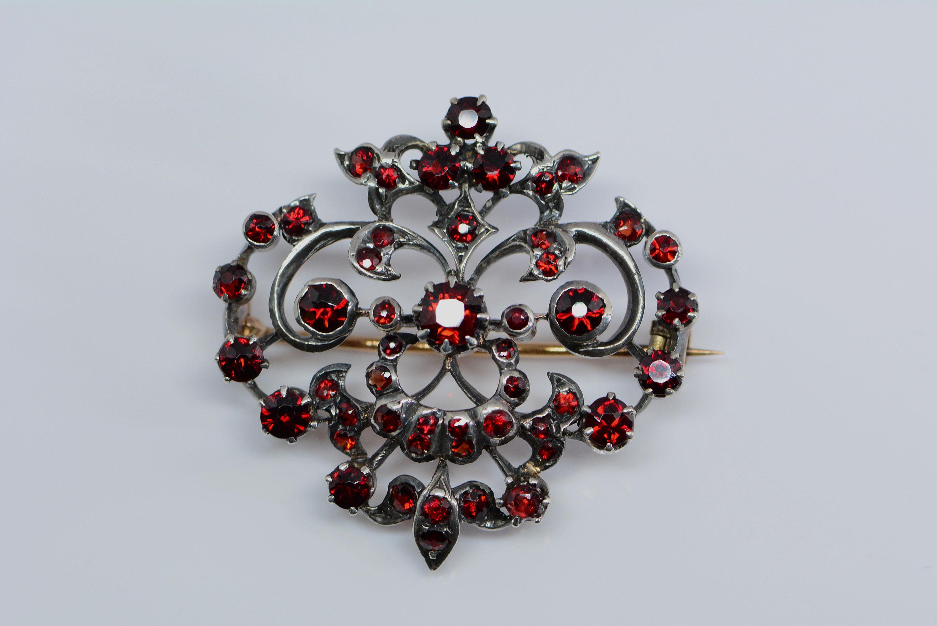 
This brooch is a good example of how the victorians used silver on top of gold to prevent silver tarnish from staining the skin or clothes and to still have the desired look of a white metal. 
This method was used before white gold was invented or
