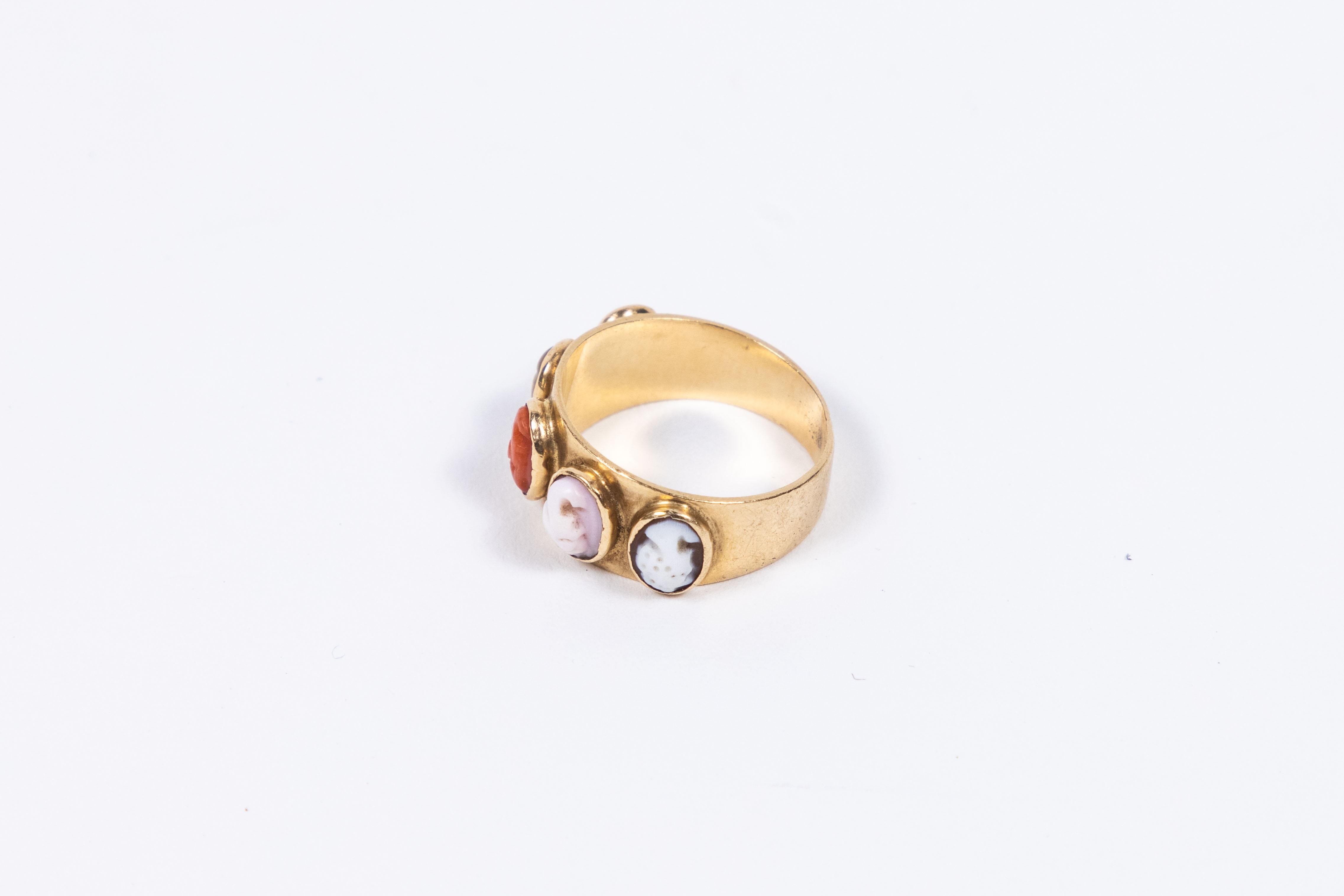 Unique Victorian 16K gold cigar band ring with 5 multi-color Cameos, carved from Shell, Mother of Pearl and Coral
Size 7