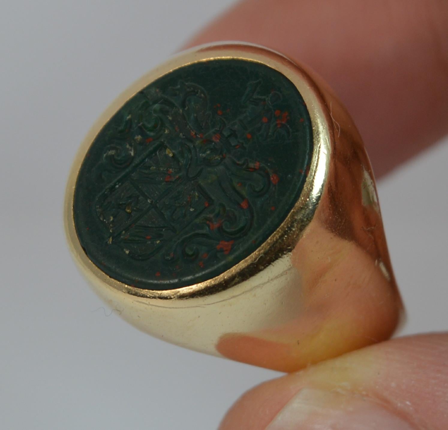 Oval Cut Victorian 18 Carat Gold and Bloodstone Intaglio Signet Seal Family Crest Ring