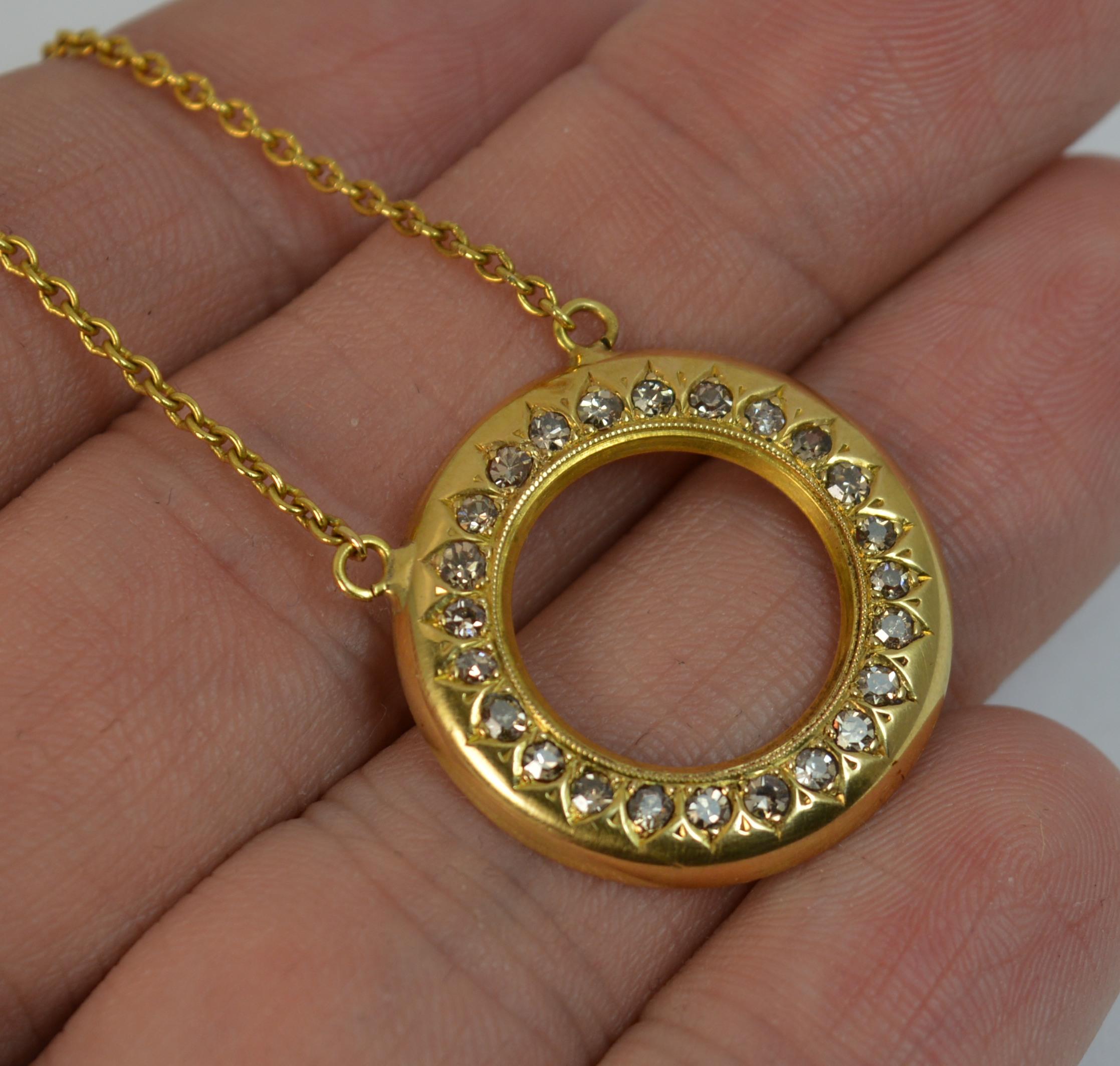 
A beautiful Victorian period pendant and chain.

Solid 18 carat yellow gold example.

The pendant designed as a disc, possibly once a watch face, set with 25 natural old cut diamonds.


CONDITION ; Very good for age. Crisp design. Well set
