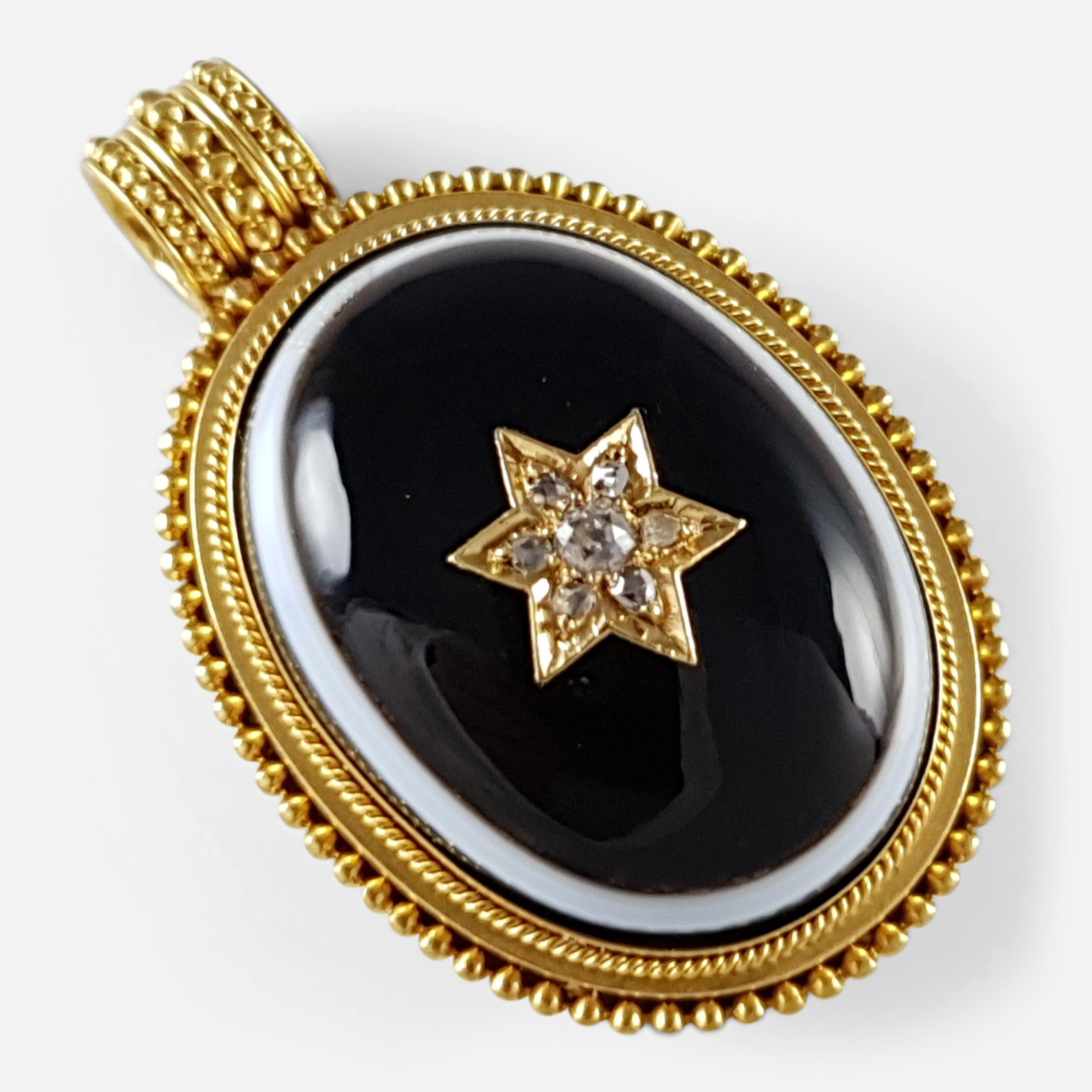 Antique Victorian 18 carat yellow gold memorial locket, featuring a bulls-eye banded agate set with six diamonds in a star formation, framed by a bead and rope design. The back of the locket includes a glazed panel.

 • Gold Content: Tested and