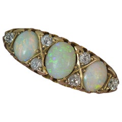 Victorian 18 Carat Gold Natural Opal and Old Cut Diamond Cluster Ring