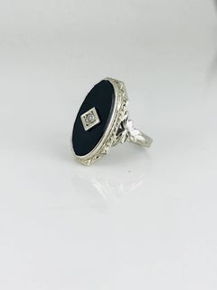 Victorian 18 Karat Black Onyx Ring with Diamond