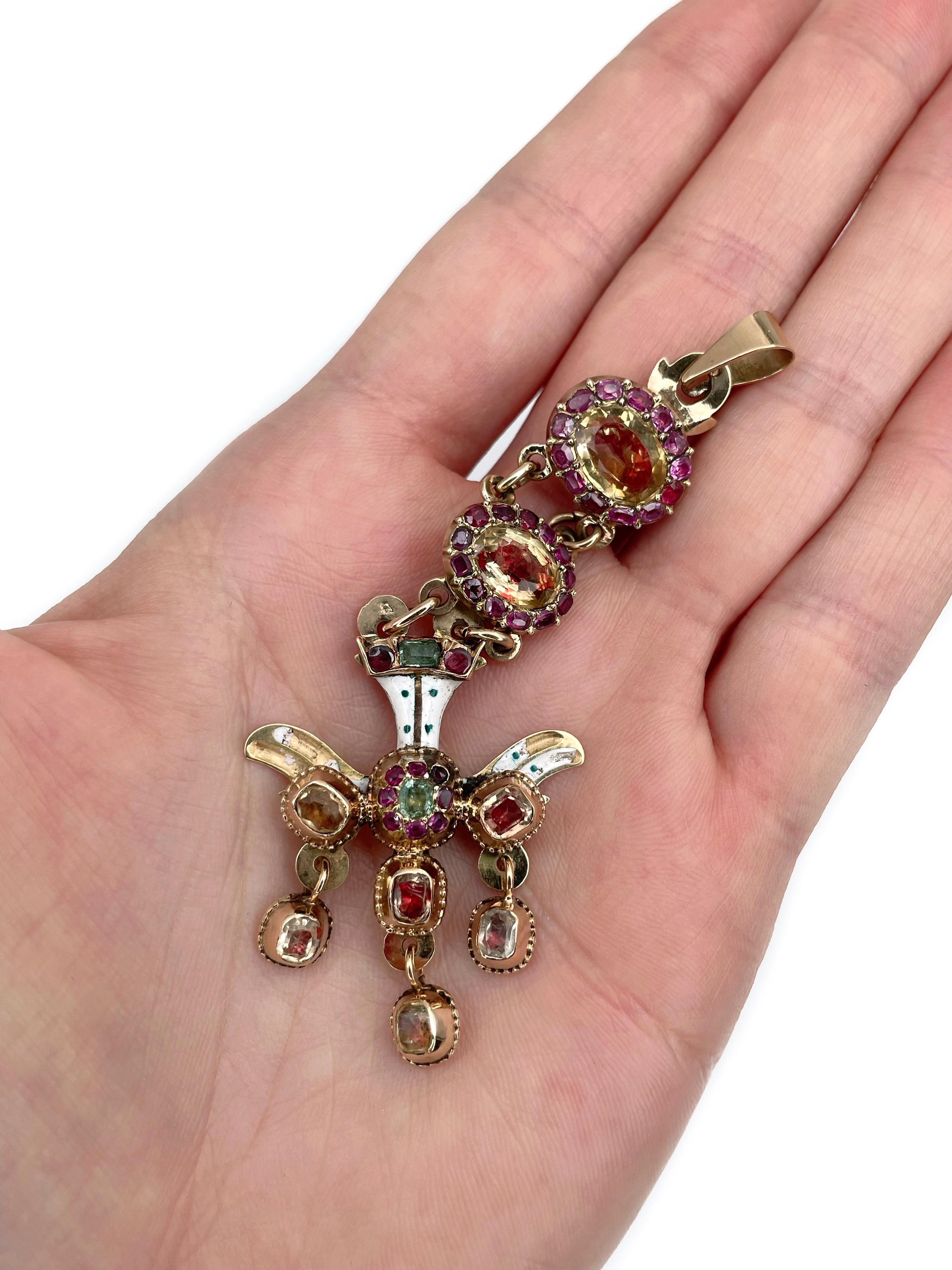 This is a massive Saint Esprit (Holy Spirit) pendant crafted in 18K yellow gold. Circa 1860. 

The piece features red foiled citrines, rubies, paste, enamel (some pieces are missing). 

Weight: 12.94g
Length: 9cm

IMPORTANT: As a buyer, you are