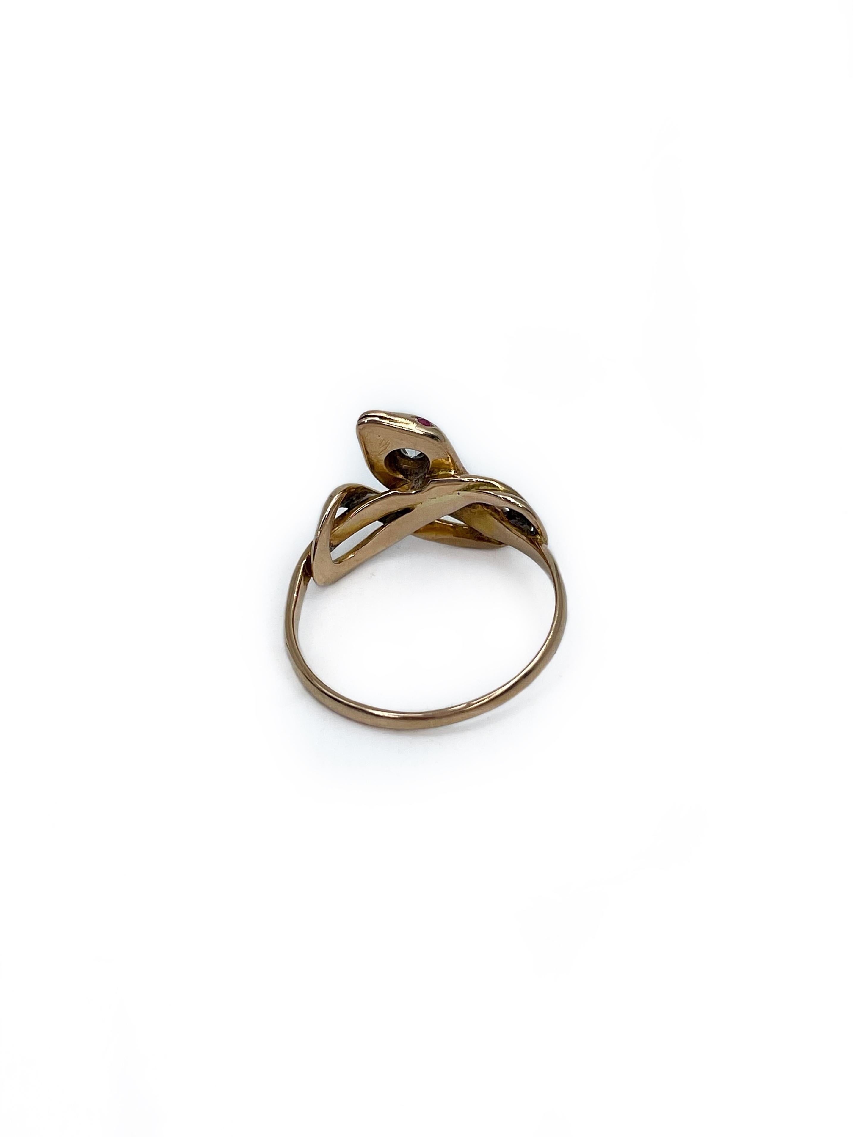 This is an antique Victorian engagement snake ring crafted in 18K yellow gold. The piece features: 
- diamond: 1pc., old cut, 0.08ct, RW, VS-SI
- rubies: 2pcs., round cut, 0.02ct, stpR 5/5, VS-SI

Weight: 3.87g
Size: 17.25 (US7)

IMPORTANT: please