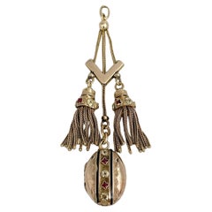 Antique Victorian 18 Karat Gold Enamel Garnet Tassel Locket Pendant