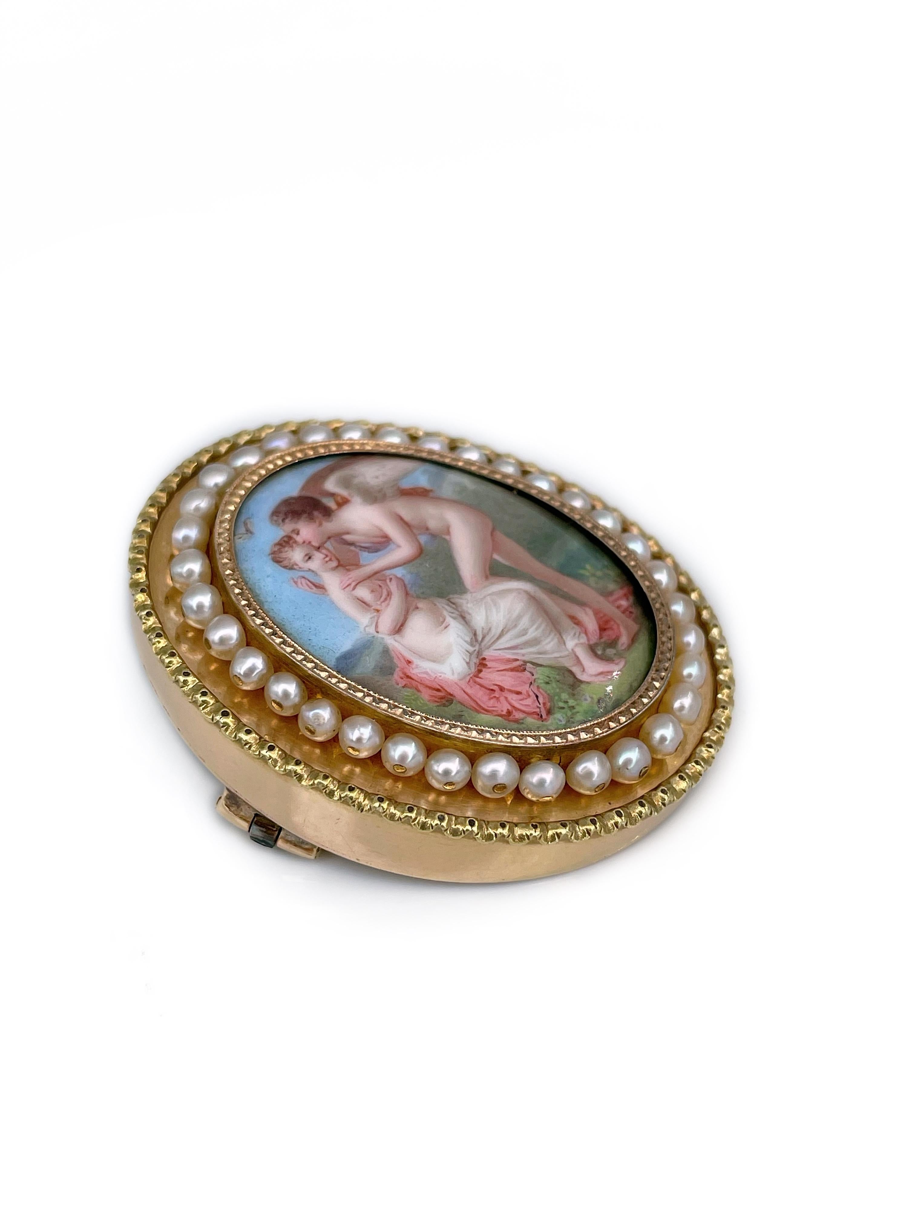 This is a Victorian oval pin brooch crafted in 18K yellow gold. Circa 1890.

The piece features a detailed miniature painting of a lady with Cupid. It is hand painted on a porcelain. The brooch is adorned with cultured pearls.

Weight: 17.67g
Size: