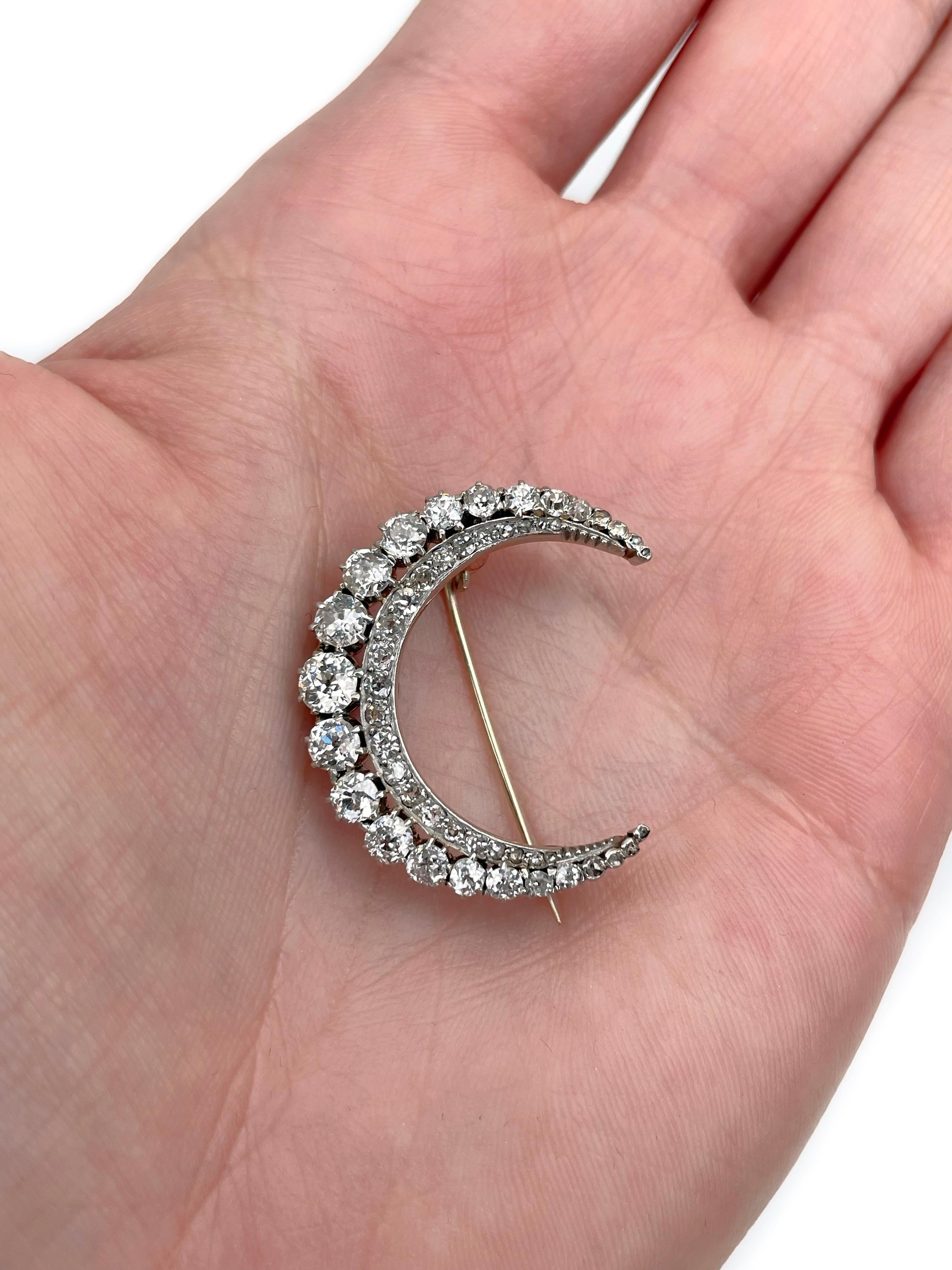 This is a Victorian crescent moon pin brooch crafted in 18K gold and 950 platinum. Circa 1890. 

The piece features old cut diamonds (TW 2.10ct):
- 32 diamonds (antique brilliant cut, TW 2.00ct, RW+/STW, SI-P1)
- 16 diamonds (rose cut, TW 0.10ct,
