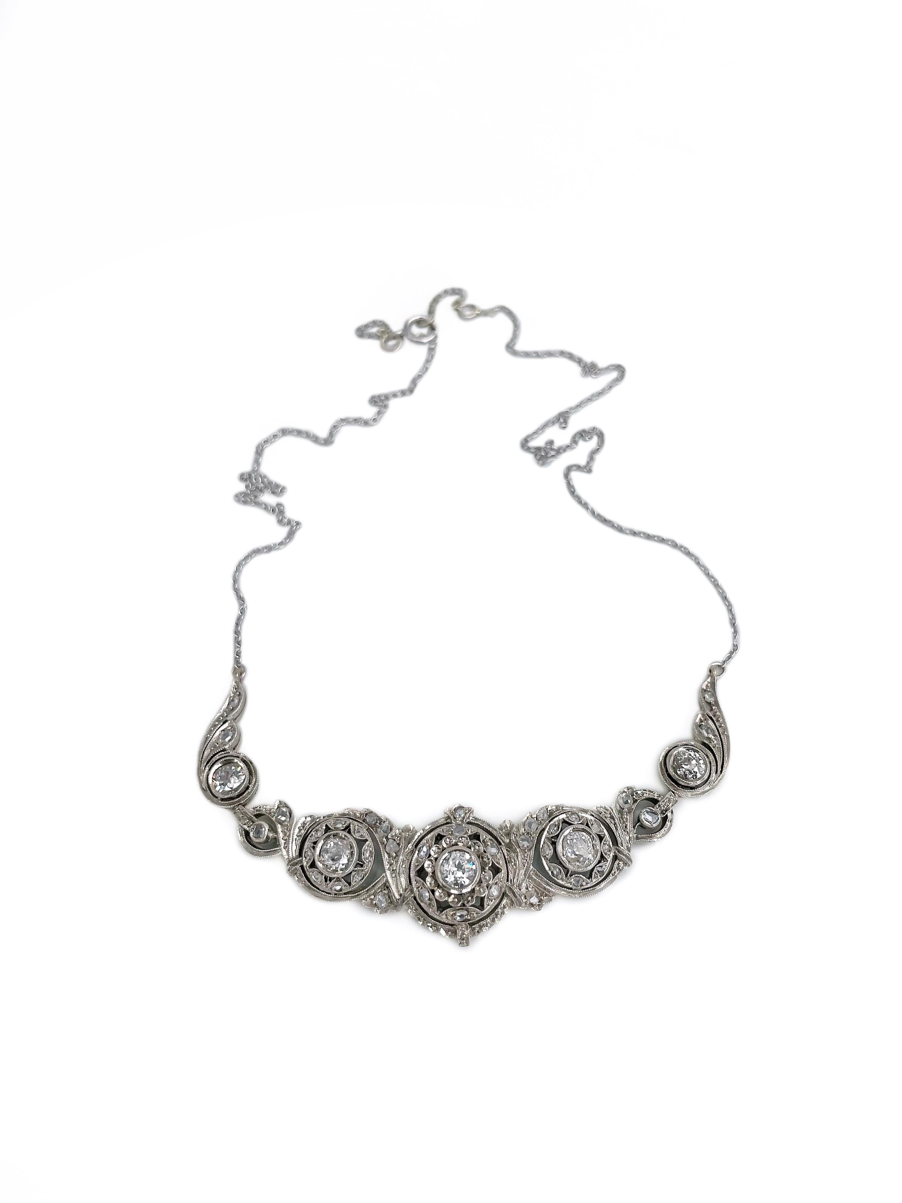This is a Victorian floral motif collier necklace. It is crafted in 14K gold and 875 silver. 

Circa 1890. 

The piece features old European cut and rose cut diamonds (TW ~1.50ct). 

Signed: 585, 875

Weight: 10.90g
Detail length: ~11cm
Length (at