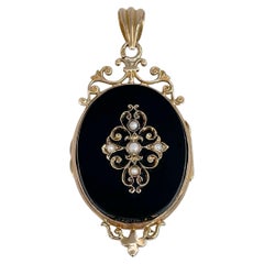 Victorian 18 Karat Gold Onyx Seed Pearl Oval Locket Pendant