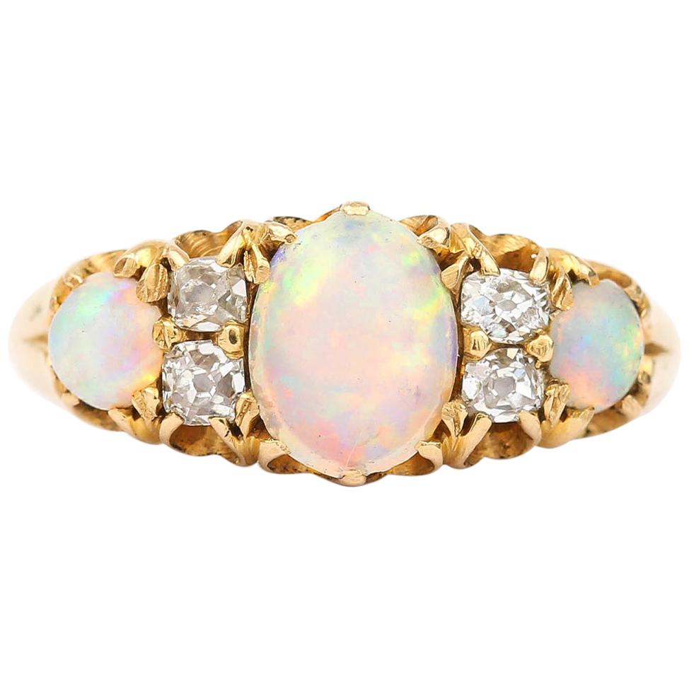 Victorian 18 Karat Gold Opal and Diamond Three Stone Gypsy Ring, circa 1890