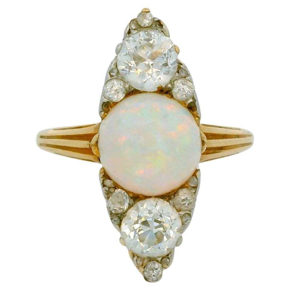 Victorian 18 Karat gold Opal and Old cut diamond Navette ring circa 1900 For Sale