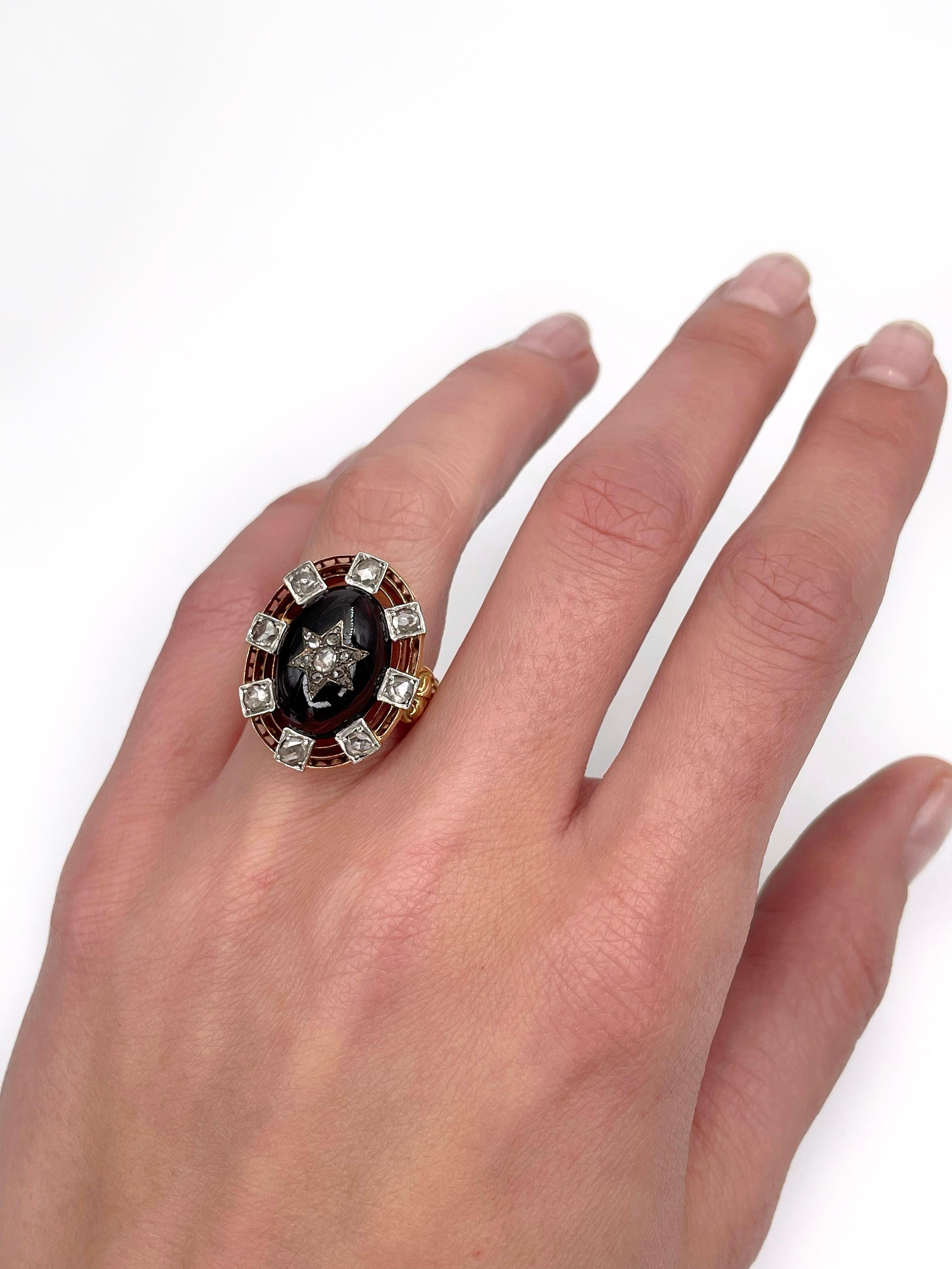 This is a stunning Victorian star ring crafted in 18K gold. Circa 1870. It features beautiful purple red  oval cabochon cut garnet and rose cut diamonds of various sizes. 

Weight: 8.29g 
Size: 15.5 (US 4.75)

IMPORTANT: please ask about the