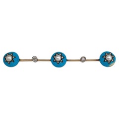 Broche victoriano de oro de 18 quilates con perlas, diamantes y esmalte azul claro con motivo de estrellas