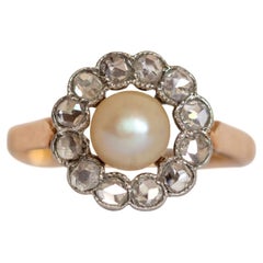 Bague victorienne en or 18 carats et perle avec halo de diamants taille rose, c. 1900