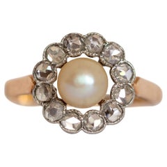 Victorian 18 Karat Gold Pearl Ring with Rose Cut Diamond Halo, circa 1900s