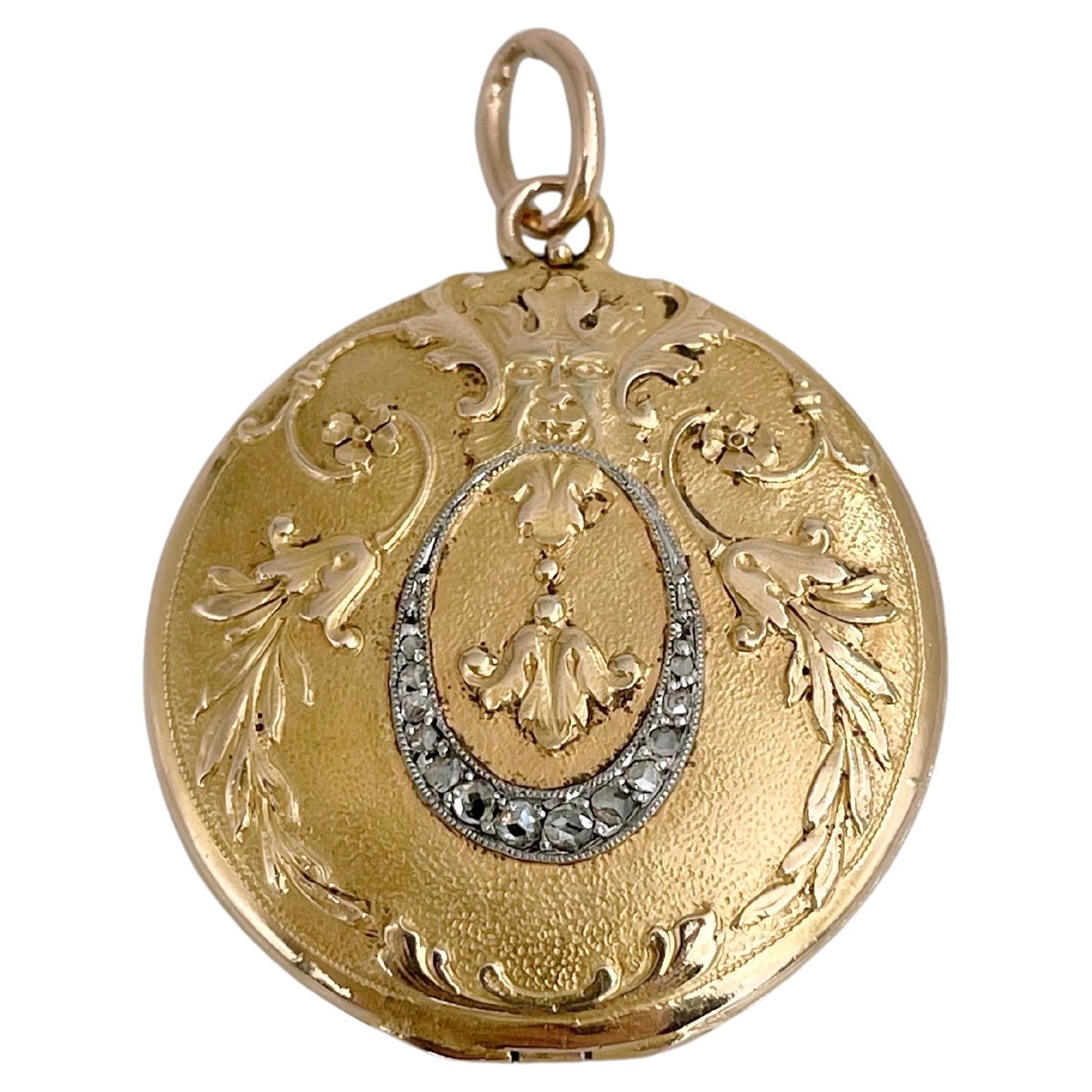 Colgante relicario redondo victoriano de oro de 18 quilates con diamantes talla rosa y motivo floral