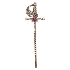 Broche épée victorienne en or 18 carats, rubis, perle et diamant taille ancienne